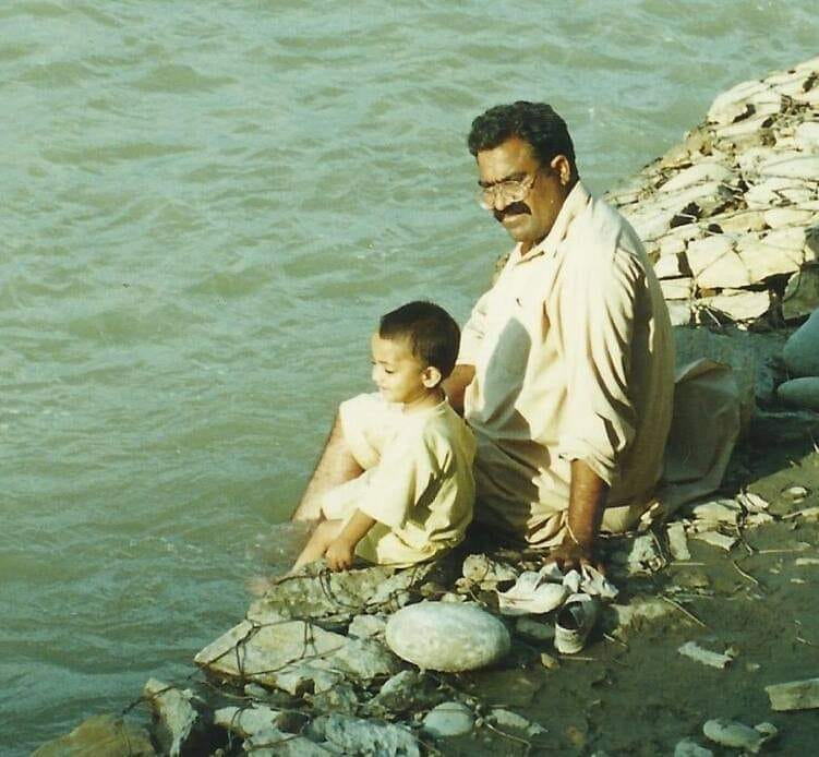 A childhood image of Faraz Qadir and his Father